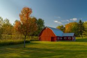 Fall colors and a red barn in Vermont
