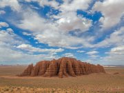 Gilson Butte's ancient sentinels stand tall against a canvas of