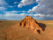Gilson Butte standing tall against a dramatic sky