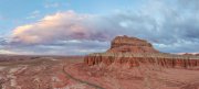 Whispers of twilight paint the desert sky